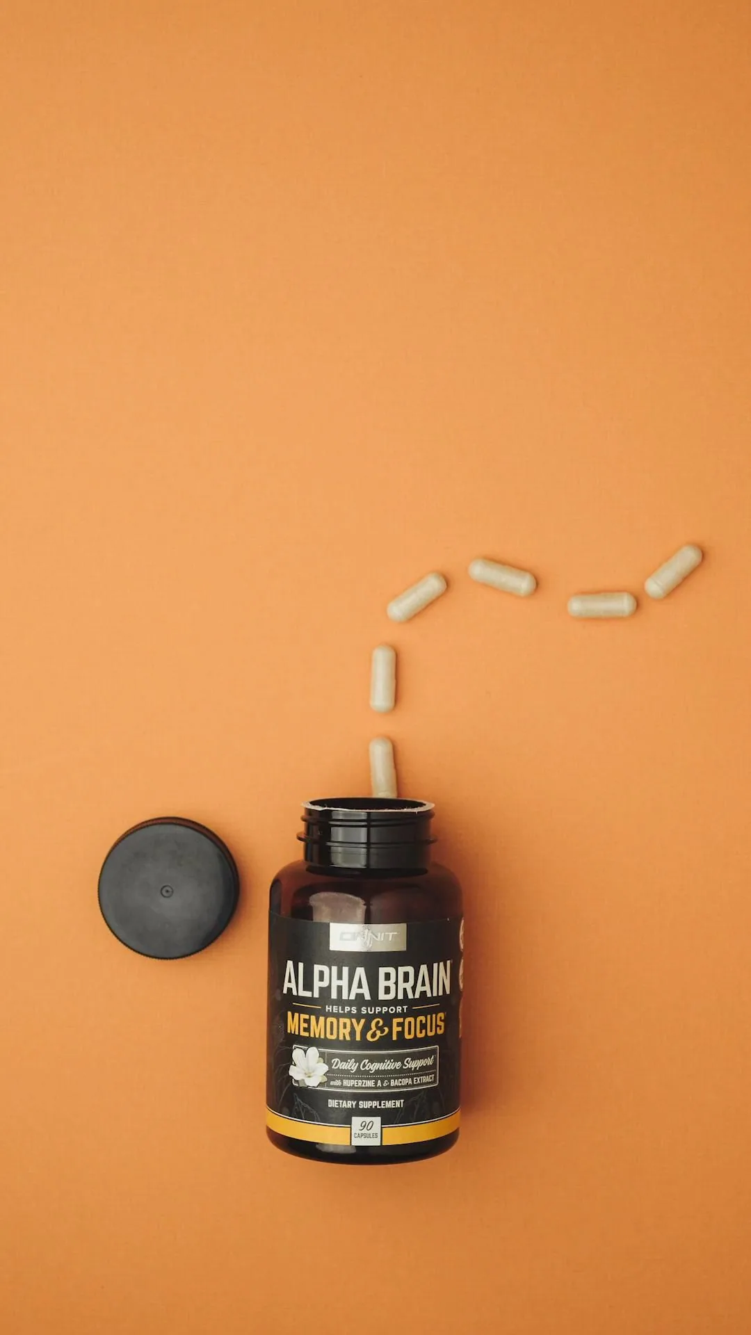 Alpha Brain supplement bottle with product capsules